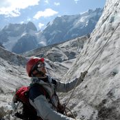 Young mountaineer is working out on a glacier during training courses. Mountaineering course in Nepal.