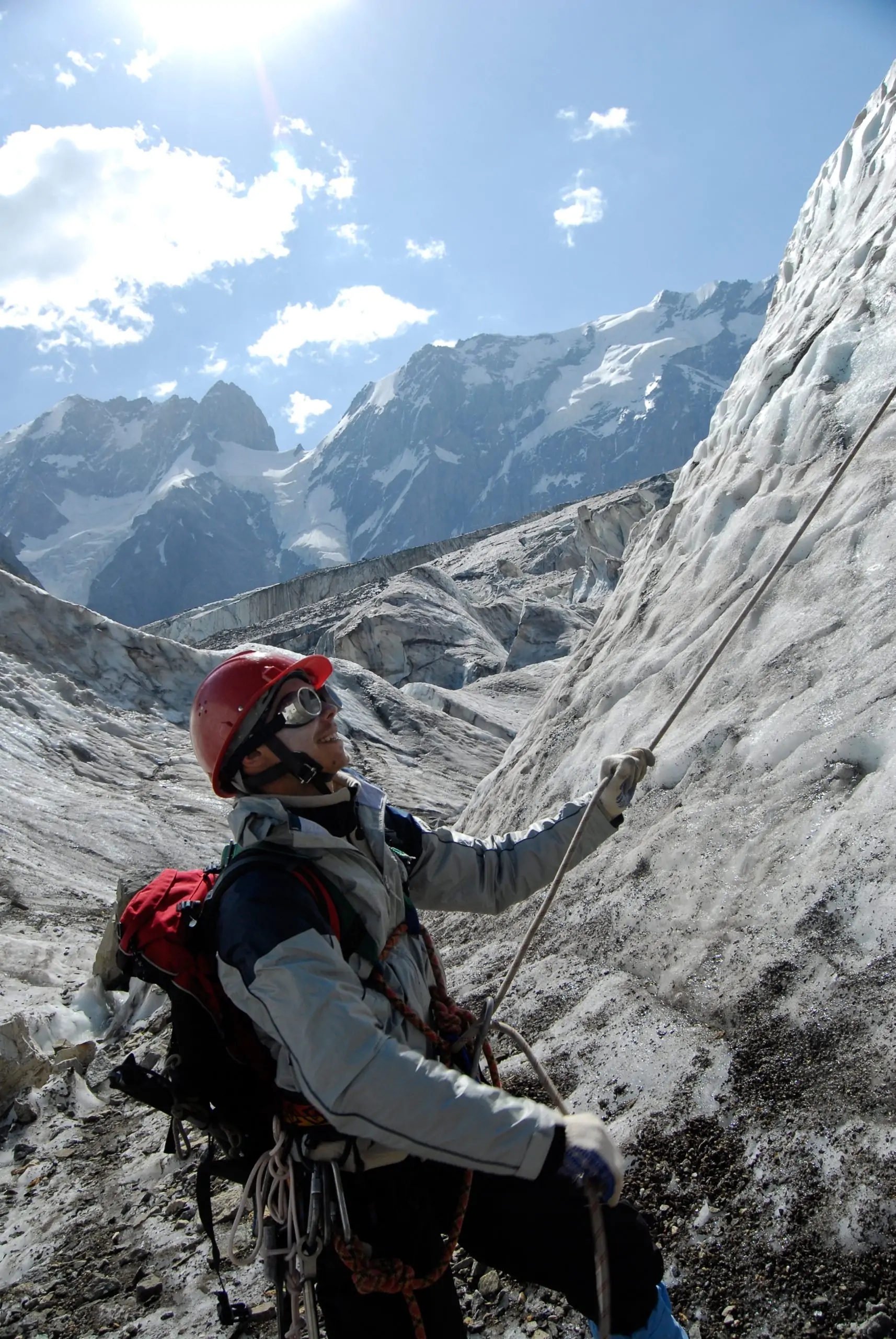 Young mountaineer is working out on a glacier during training courses. Mountaineering course in Nepal.