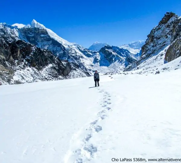 Mountainous landscape along the trail leading towards Everest Base Camp with rugged peaks under a clear sky in Everest Three Passes Trek.