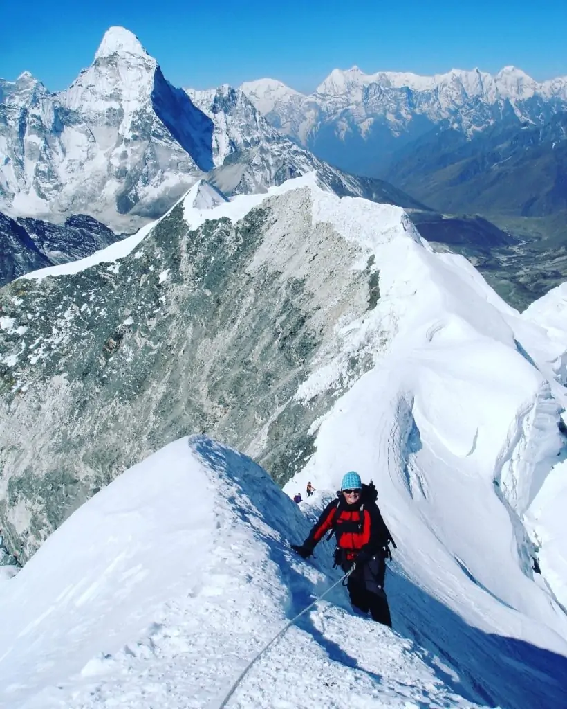 Trekker en-route to everest summit; ebc trek nepal ; women empowerment.