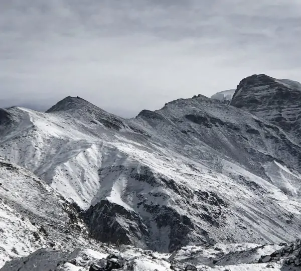 Towering snow-covered mountain in the Kanchenjunga range of eastern Nepal.