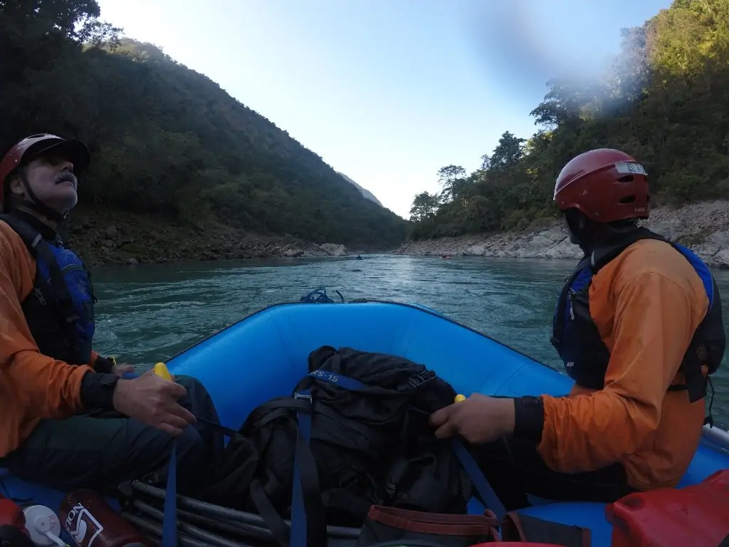 A group of rafters navigating the flowing waters of Karnali River