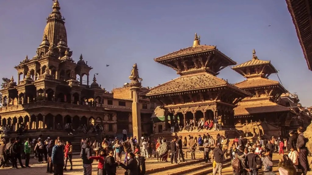 Historic Patan Durbar Square showcasing traditional Newari temples and palace structures in Kathmandu Valley, Nepal.