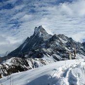 Trekking in Nepal during winter on the Mardi Himal Trek with snow-covered Himalayan mountains