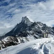 Trekking in Nepal during winter on the Mardi Himal Trek with snow-covered Himalayan mountains